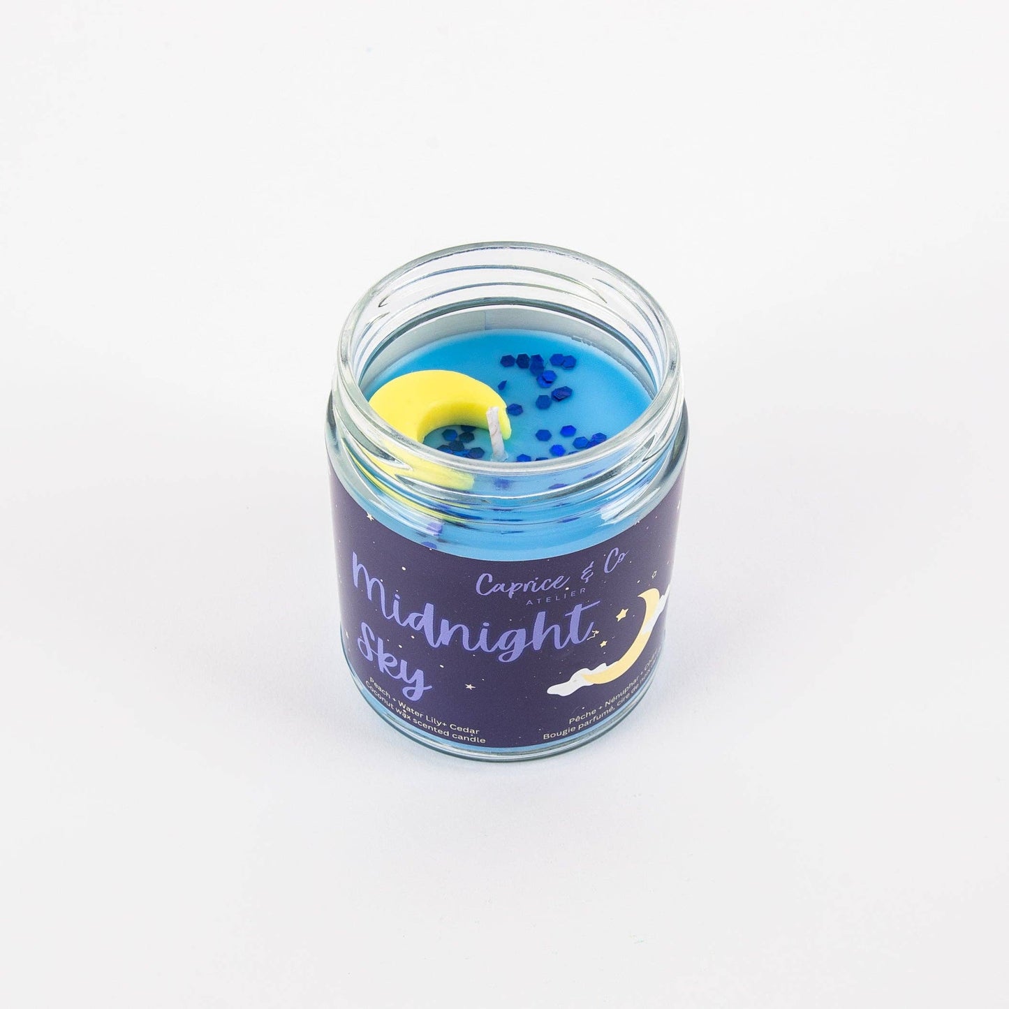 Caprice & Co - Midnight Sky Candle - Peach + Waterlily + Cedar